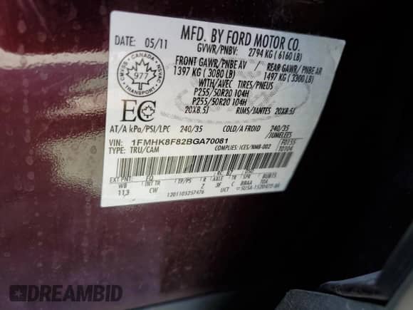 2011 Ford Explorer Limited z VIN 1FMHK8F82BGA70081, wystawiony jako Copart lot #80577395 z przebiegiem 153 513 mil mil oraz Szkoda całkowita • Salvage title. Historia ofert i sprzedaży dostępna na DreamBid. Obrazek 13.