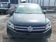 2013 Volkswagen Tiguan SE z VIN WVGAV3AX0DW621305, wystawiony jako IAAI lot #42249707 z przebiegiem 139 500 mil mil oraz . Historia ofert i sprzedaży dostępna na DreamBid. Obrazek 6.