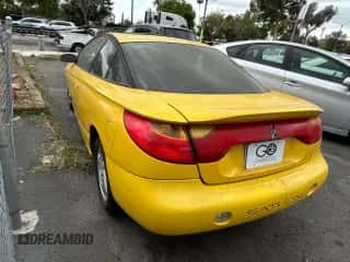 2001 Saturn SC with VIN 1G8ZY12771Z105142, listed as a Copart auction lot 54940825 with 166,396 mi miles and Clean title. Bid and sale history available at DreamBid. Image 3.
