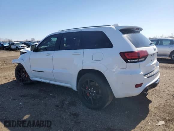 2018 Jeep Grand Cherokee SRT z VIN 1C4RJFDJ0JC444411, wystawiony jako Copart lot #49353655 z przebiegiem 66 780 mil mil oraz Szkoda całkowita • Salvage title. Historia ofert i sprzedaży dostępna na DreamBid. Obrazek 2.