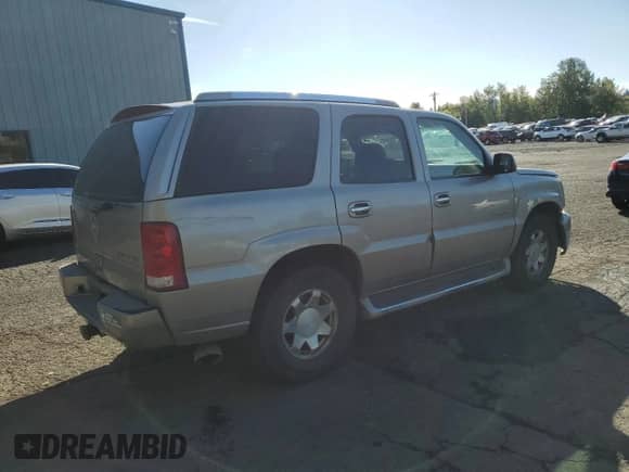2002 Cadillac Escalade с VIN 1GYEK63N32R287000, выставлен на аукционе Copart как лот 81931135 с пробегом 354 114 миль миль и Списание • Salvage title. История ставок и продаж доступна на DreamBid. Изображение 3.