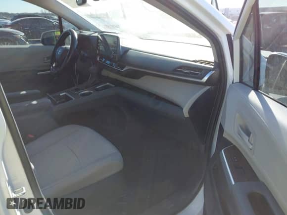 2024 Toyota Sienna LE with VIN 5TDBRKEC0RS217006, listed as a IAAI auction lot 41389239 with 23,983 mi miles and . Bid and sale history available at DreamBid. Image 5.