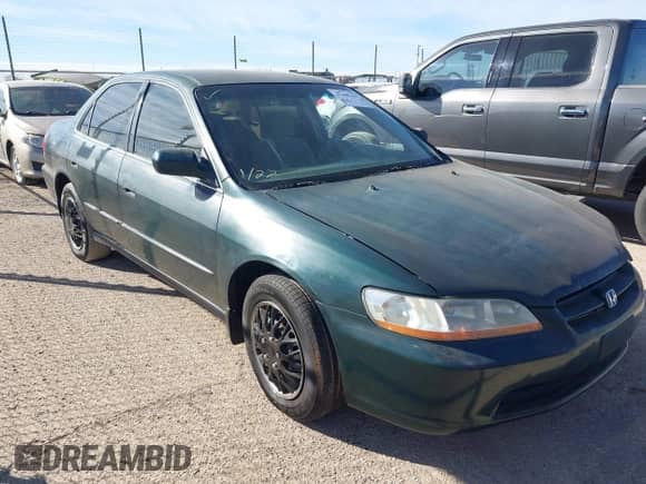 1998 Honda Accord LX z VIN 1HGCG1646WA035364, wystawiony jako IAAI lot #41409101 z przebiegiem 223 678 mil mil oraz . Historia ofert i sprzedaży dostępna na DreamBid. Obrazek 1.