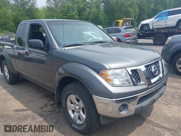 2009 Nissan Frontier SE with VIN 1N6AD06W09C420158, listed as a IAAI auction lot 42436899 with 173,010 mi miles and . Bid and sale history available at DreamBid. Image 1.