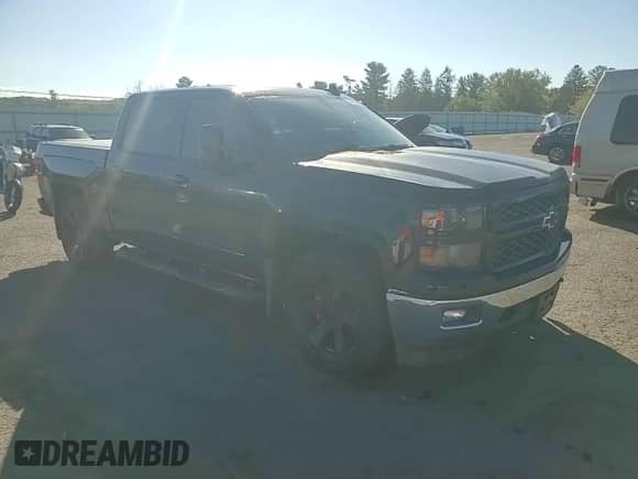 2015 Chevrolet Silverado 1500 LT z VIN 3GCUKREC7FG493960, wystawiony jako Copart lot #81196975 z przebiegiem Nie podano mil oraz Szkoda całkowita • Salvage title. Historia ofert i sprzedaży dostępna na DreamBid. Obrazek 13.