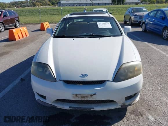 2006 Hyundai Tiburon GT с VIN KMHHN65F46U208237, выставлен на аукционе IAAI как лот 43492233 с пробегом 262 656 миль миль и . История ставок и продаж доступна на DreamBid. Изображение 6.