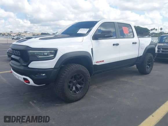 2023 Ram 1500 TRX z VIN 1C6SRFU95PN572888, wystawiony jako IAAI lot #43319141 z przebiegiem 17 078 mil mil oraz . Historia ofert i sprzedaży dostępna na DreamBid. Obrazek 18.