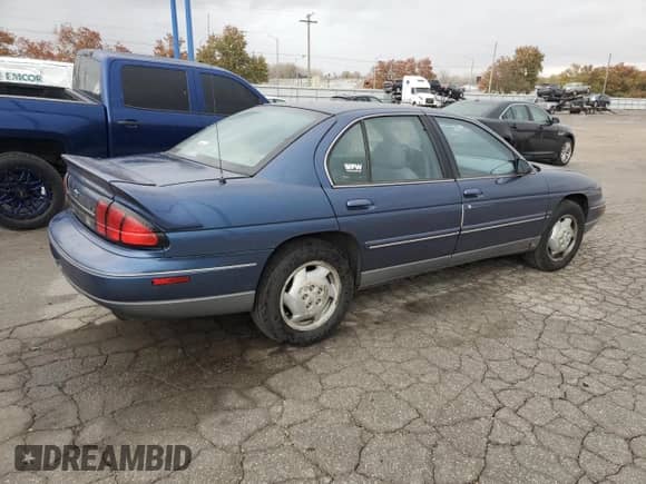 1995 Chevrolet Lumina с VIN 2G1WN52X2S9261618, выставлен на аукционе Copart как лот 76243574 с пробегом 107 191 миль миль и Списание • Salvage title. История ставок и продаж доступна на DreamBid. Изображение 3.