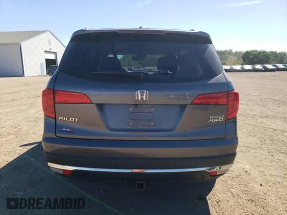 2017 Honda Pilot Touring z VIN 5FNYF6H95HB054723, wystawiony jako Copart lot #84872875 z przebiegiem 127 730 mil mil oraz Szkoda całkowita • Salvage title. Historia ofert i sprzedaży dostępna na DreamBid. Obrazek 6.
