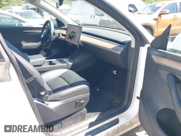 2023 Tesla Model Y Long Range с VIN 7SAYGDEEXPA103397, выставлен на аукционе IAAI как лот 42781803 с пробегом 28 537 миль миль и . История ставок и продаж доступна на DreamBid. Изображение 5.