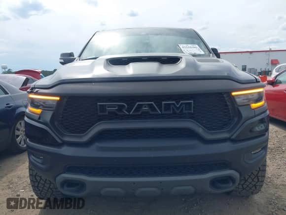 2022 Ram 1500 TRX with VIN 1C6SRFU97NN112337, listed as a IAAI auction lot 42210305 with 47,322 mi miles and . Bid and sale history available at DreamBid. Image 6.