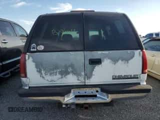 1996 Chevrolet Tahoe с VIN 1GNEC13R8TJ421533, выставлен на аукционе Copart как лот 76129824 с пробегом 190 015 миль миль и На запчасти • Non repairable. История ставок и продаж доступна на DreamBid. Изображение 6.