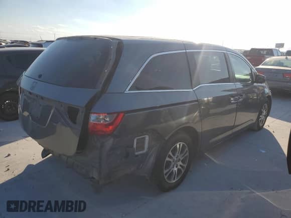 2012 Honda Odyssey EX z VIN 5FNRL5H41CB120012, wystawiony jako Copart lot #87036855 z przebiegiem 120 980 mil mil oraz Szkoda całkowita • Salvage title. Historia ofert i sprzedaży dostępna na DreamBid. Obrazek 3.