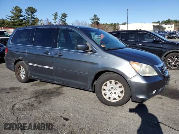 2010 Honda Odyssey LX с VIN 5FNRL3H25AB026750, выставлен на аукционе Copart как лот 83935635 с пробегом 228 585 миль миль и На запчасти • Non repairable. История ставок и продаж доступна на DreamBid. Изображение 4.