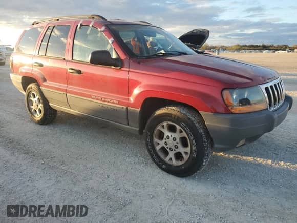 2002 Jeep Grand Cherokee с VIN 1J8GX38S82C176323, выставлен на аукционе Copart как лот 78520444 с пробегом 206 258 миль миль и Списание • Salvage title. История ставок и продаж доступна на DreamBid. Изображение 4.
