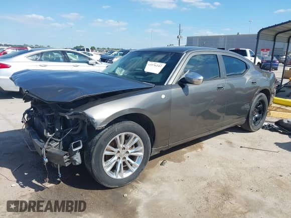 2008 Dodge Charger with VIN 2B3LA43RX8H173304, listed as a IAAI auction lot 41976242 with 150,736 mi miles and . Bid and sale history available at DreamBid. Image 18.