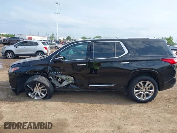 2021 Chevrolet Traverse High Country z VIN 1GNEVNKW9MJ250043, wystawiony jako IAAI lot #42769955 z przebiegiem 33 010 mil mil oraz . Historia ofert i sprzedaży dostępna na DreamBid. Obrazek 14.