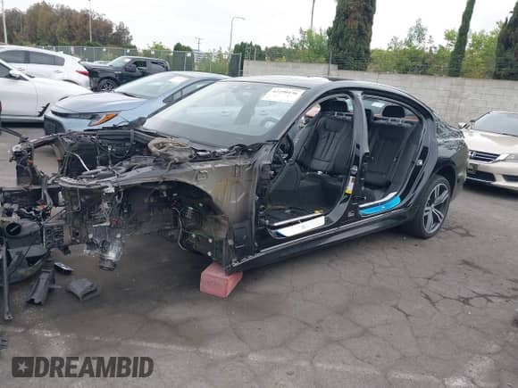 2019 BMW 7 Series 740i with VIN WBA7E2C50KB454417, listed as a IAAI auction lot 42290156 with Not provided miles and . Bid and sale history available at DreamBid. Image 2.