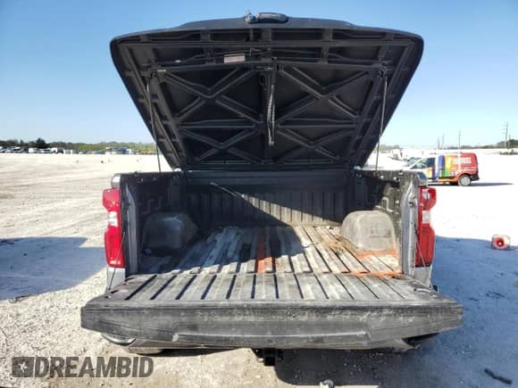 2021 Chevrolet Silverado 1500 RST с VIN 3GCPWDET7MG180599, выставлен на аукционе Copart как лот 45180295 с пробегом 97 279 миль миль и Списание • Salvage title. История ставок и продаж доступна на DreamBid. Изображение 6.