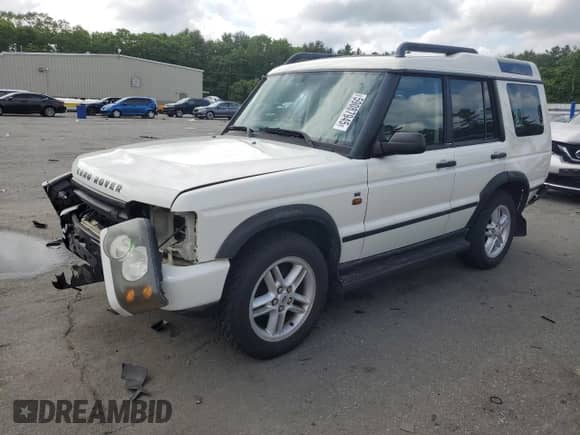 2004 Land Rover Discovery SE with VIN SALTY19474A846653, listed as a Copart auction lot 59087945 with 93,774 mi miles and Salvage title. Bid and sale history available at DreamBid. Image 1.