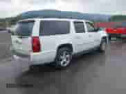 2009 Chevrolet Suburban LTZ z VIN 1GNFK36379R281088, wystawiony jako IAAI lot #42833740 z przebiegiem 220 921 mil mil oraz . Historia ofert i sprzedaży dostępna na DreamBid. Obrazek 4.