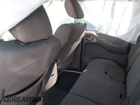 2020 Nissan Frontier Pro-4X with VIN 1N6ED0EB8LN712068, listed as a IAAI auction lot 41207975 with 73,717 mi miles and . Bid and sale history available at DreamBid. Image 8.