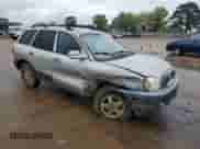 2004 Hyundai Santa Fe z VIN KM8SB12B84U825804, wystawiony jako Copart lot #51107585 z przebiegiem 229 942 mil mil oraz Szkoda całkowita • Salvage title. Historia ofert i sprzedaży dostępna na DreamBid. Obrazek 4.