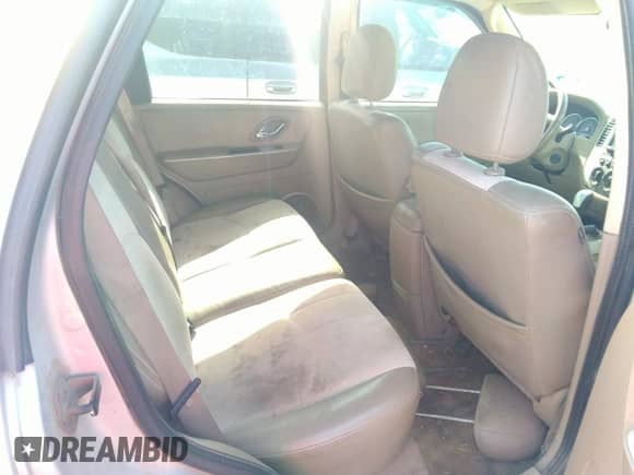 2007 Mercury Mariner Premier with VIN 4M2CU97107KJ08843, listed as a IAAI auction lot 41748968 with 194,183 mi miles and . Bid and sale history available at DreamBid. Image 8.