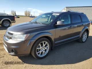 2015 Dodge Journey R/T with VIN 3C4PDDFG2FT671454, listed as a Copart auction lot 86496615 with 132,854 mi miles and Clean title. Bid and sale history available at DreamBid. Image 1.