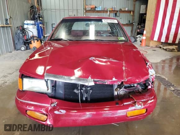 1991 Dodge Spirit with VIN 1B3XA46K7MF556659, listed as a Copart auction lot 63274095 with 107,254 mi miles and Salvage title. Bid and sale history available at DreamBid. Image 5.