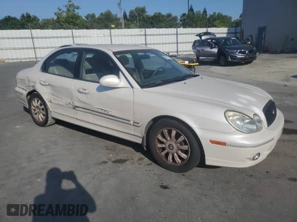2002 Hyundai Sonata GLS z VIN KMHWF35H02A507630, wystawiony jako Copart lot #59651905 z przebiegiem 211 924 mil mil oraz Nie do naprawy • Non repairable. Historia ofert i sprzedaży dostępna na DreamBid. Obrazek 4.