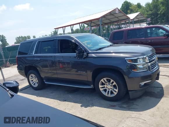 2015 Chevrolet Tahoe LTZ with VIN 1GNSKCKC2FR588524, listed as a IAAI auction lot 42851274 with 101,426 mi miles and . Bid and sale history available at DreamBid. Image 13.