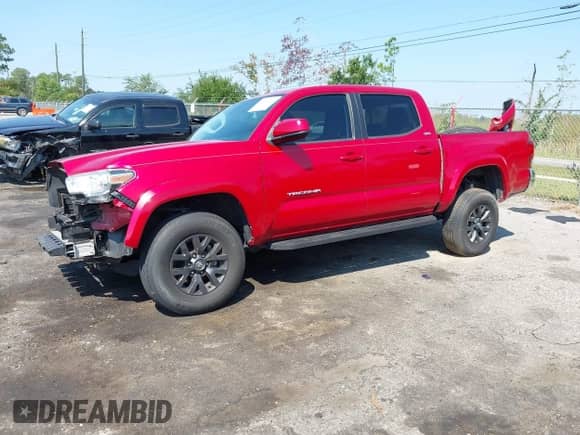 2021 Toyota Tacoma SR5 with VIN 3TYAZ5CN0MT012512, listed as a IAAI auction lot 43257664 with 34,488 mi miles and . Bid and sale history available at DreamBid. Image 2.