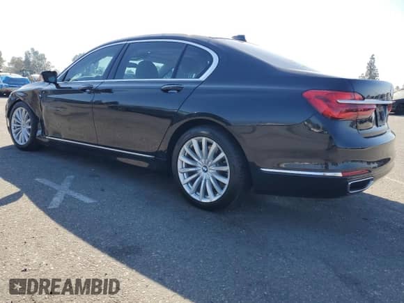 2018 BMW 7 Series 740i z VIN WBA7E2C59JG741921, wystawiony jako Copart lot #66907325 z przebiegiem 62 678 mil mil oraz Szkoda całkowita • Salvage title. Historia ofert i sprzedaży dostępna na DreamBid. Obrazek 2.