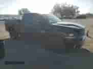 2014 Ram 1500 Sport with VIN 1C6RR6HT8ES301875, listed as a Copart auction lot 79619814 with 107,726 mi miles and Salvage title. Bid and sale history available at DreamBid. Image 4.