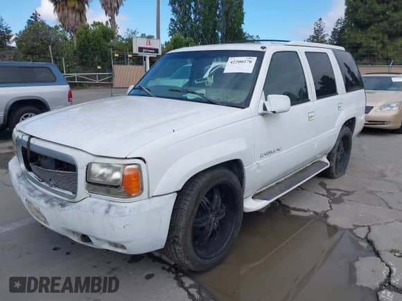 2000 Cadillac Escalade with VIN 1GYEK63R9YR180416, listed as a IAAI auction lot 42200278 with 145,848 mi miles and . Bid and sale history available at DreamBid. Image 6.