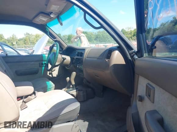 2000 Toyota Tacoma with VIN 4TAWM72N7YZ683933, listed as a IAAI auction lot 43154039 with 234,697 mi miles and . Bid and sale history available at DreamBid. Image 5.