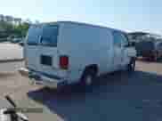 1999 Ford Econoline Cargo with VIN 1FTRE1420XHA34056, listed as a IAAI auction lot 41998411 with 236,267 mi miles and . Bid and sale history available at DreamBid. Image 4.
