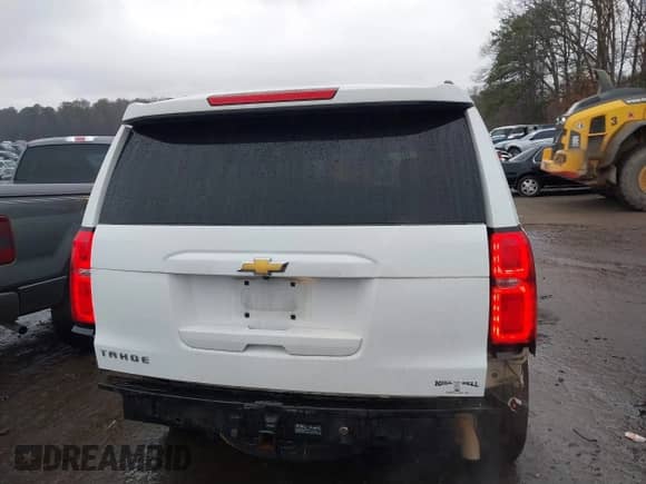 2019 Chevrolet Tahoe LS with VIN 1GNSCAEC9KR218517, listed as a IAAI auction lot 41485645 with 141,902 mi miles and . Bid and sale history available at DreamBid. Image 17.