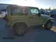 2013 Jeep Wrangler Rubicon with VIN 1C4HJWCG8DL535223, listed as a Copart auction lot 86492615 with 124,963 mi miles and Salvage title. Bid and sale history available at DreamBid. Image 3.