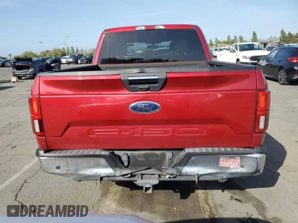 2020 Ford F-150 XL with VIN 1FTEW1C54LFC59884, listed as a Copart auction lot 54306665 with 52,223 mi miles and Salvage title. Bid and sale history available at DreamBid. Image 6.