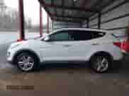 2015 Hyundai Santa Fe with VIN 5XYZWDLA2FG257231, listed as a IAAI auction lot 41868240 with 218,321 mi miles and . Bid and sale history available at DreamBid. Image 14.