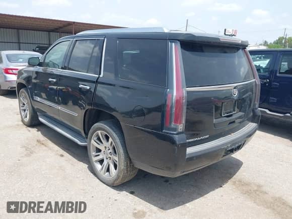 2015 Cadillac Escalade Luxury with VIN 1GYS3BKJ6FR187602, listed as a IAAI auction lot 42648552 with 164,759 mi miles and . Bid and sale history available at DreamBid. Image 3.