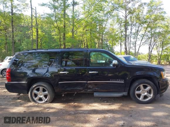 2012 Chevrolet Suburban LTZ z VIN 1GNSCKE08CR323305, wystawiony jako IAAI lot #42149176 z przebiegiem 142 878 mil mil oraz . Historia ofert i sprzedaży dostępna na DreamBid. Obrazek 13.