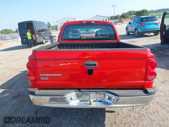 2006 Dodge Dakota SLT with VIN 1D7HE48KX6S517780, listed as a IAAI auction lot 42903418 with 218,769 mi miles and . Bid and sale history available at DreamBid. Image 16.
