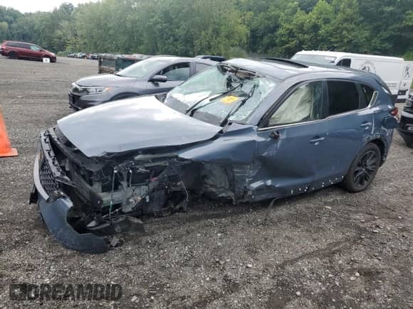 2023 Mazda CX-5 S Preferred z VIN JM3KFBCM5P0199095, wystawiony jako Copart lot #67264225 z przebiegiem 7 969 mil mil oraz Szkoda całkowita • Salvage title. Historia ofert i sprzedaży dostępna na DreamBid. Obrazek 1.