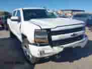 2018 Chevrolet Silverado 1500 LT with VIN 1GCUKRECXJF180945, listed as a IAAI auction lot 42450588 with 108,199 mi miles and . Bid and sale history available at DreamBid. Image 6.