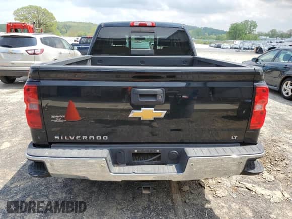 2015 Chevrolet Silverado 1500 LT with VIN 3GCUKREHXFG290086, listed as a Copart auction lot 56853315 with 127,294 mi miles and Clean title. Bid and sale history available at DreamBid. Image 6.