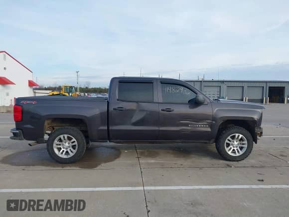 2014 Chevrolet Silverado 1500 LT with VIN 3GCUKREH9EG499110, listed as a IAAI auction lot 41482932 with 222,838 mi miles and . Bid and sale history available at DreamBid. Image 13.
