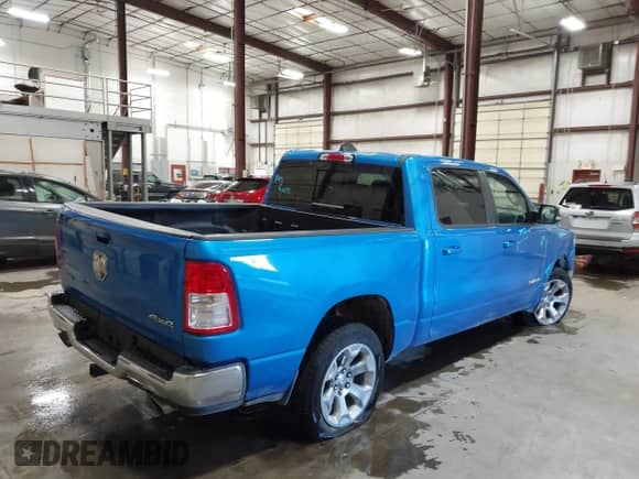 2021 Ram 1500 Big Horn with VIN 1C6SRFFT7MN694639, listed as a IAAI auction lot 43253486 with 77,360 mi miles and . Bid and sale history available at DreamBid. Image 4.